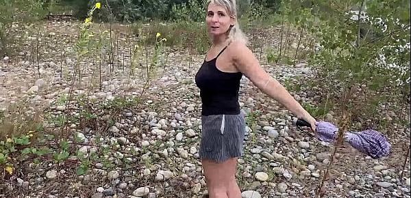  Busty MILF almost caught while fucking by the river